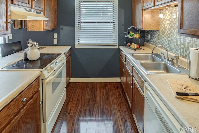 1811 Ramada Blvd Unit 6, Collinsville, IL 62234 - kitchen featuring under cabinet range hood, white appliances, a sink, dark wood-style floors, and baseboards