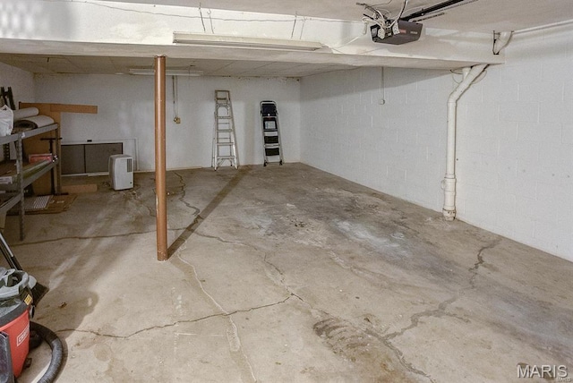 1811 Ramada Blvd Unit 6, Collinsville, IL 62234 - garage featuring a garage door opener