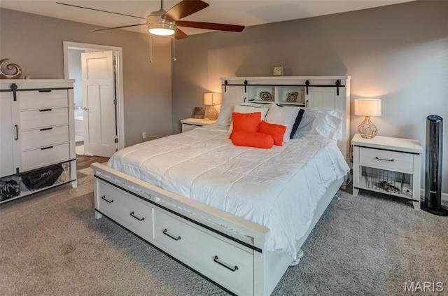 bedroom featuring carpet and a ceiling fan