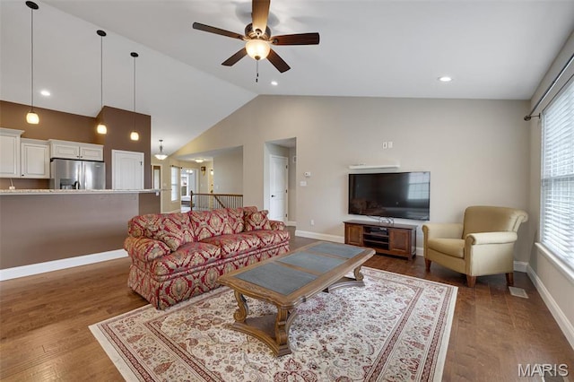 433 Cherry Creek Ln, Farmington, MO 63640 - living room with lofted ceiling, a ceiling fan, wood finished floors, and healthy amount of natural light