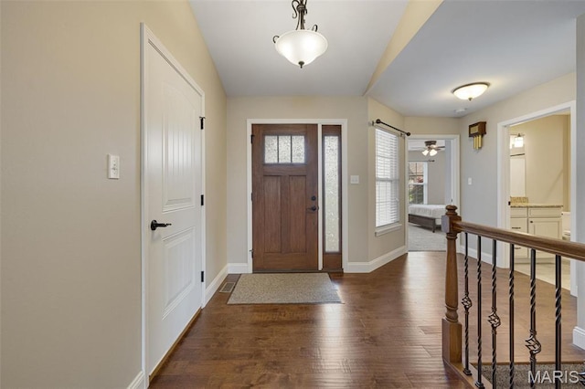 433 Cherry Creek Ln, Farmington, MO 63640 - entryway featuring dark wood finished floors and baseboards