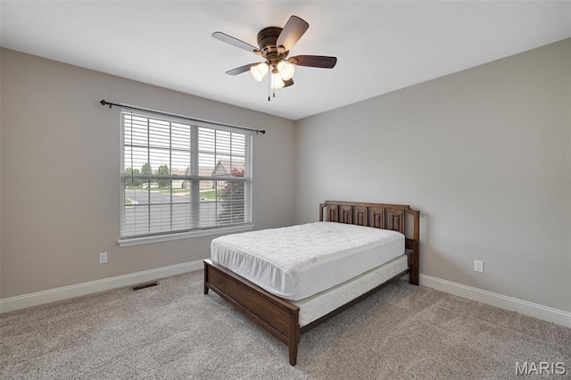 433 Cherry Creek Ln, Farmington, MO 63640 - carpeted bedroom with baseboards and ceiling fan