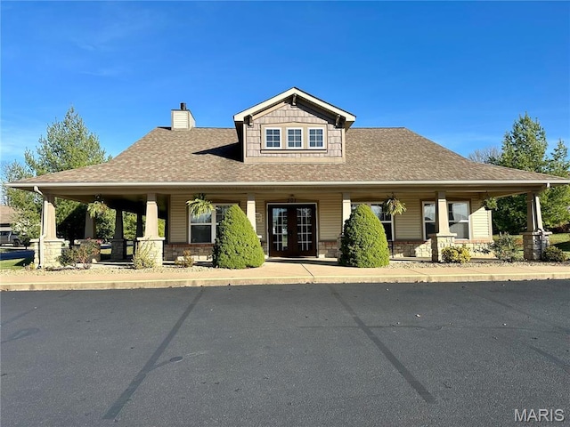 433 Cherry Creek Ln, Farmington, MO 63640 - view of front of property featuring a porch, a chimney, and a shingled roof