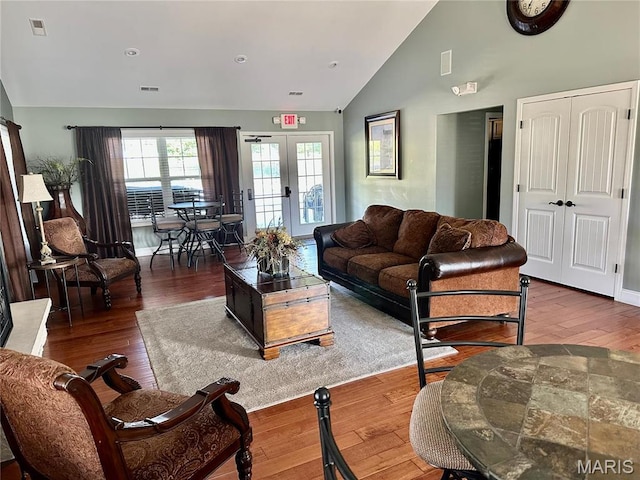433 Cherry Creek Ln, Farmington, MO 63640 - living area with french doors, wood finished floors, and high vaulted ceiling
