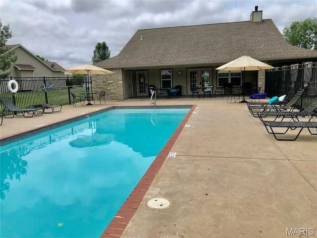433 Cherry Creek Ln, Farmington, MO 63640 - community pool with french doors, fence, and a patio