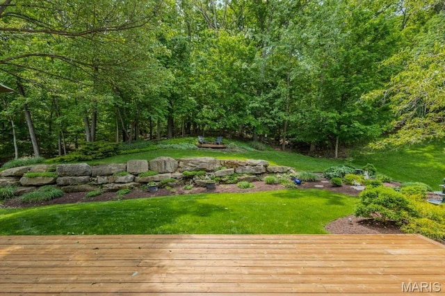 17282 Hilltop Ridge Dr, Eureka, MO 63025 - view of green lawn with a wooden deck