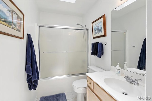 17282 Hilltop Ridge Dr, Eureka, MO 63025 - bathroom with toilet, tile patterned flooring, vanity, and enclosed tub / shower combo