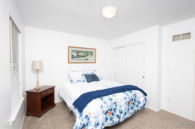 17282 Hilltop Ridge Dr, Eureka, MO 63025 - bedroom with carpet floors, a closet, and baseboards