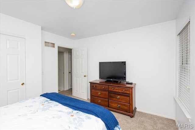 17282 Hilltop Ridge Dr, Eureka, MO 63025 - bedroom featuring light carpet and baseboards