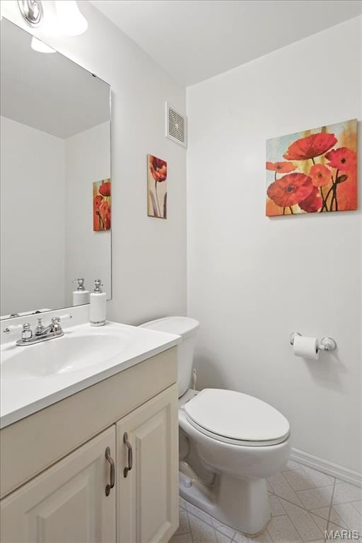 17282 Hilltop Ridge Dr, Eureka, MO 63025 - half bathroom featuring toilet, vanity, and baseboards