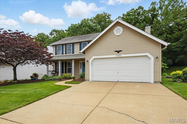 17282 Hilltop Ridge Dr, Eureka, MO 63025 - traditional-style home featuring a front lawn, driveway, a chimney, a porch, and an attached garage
