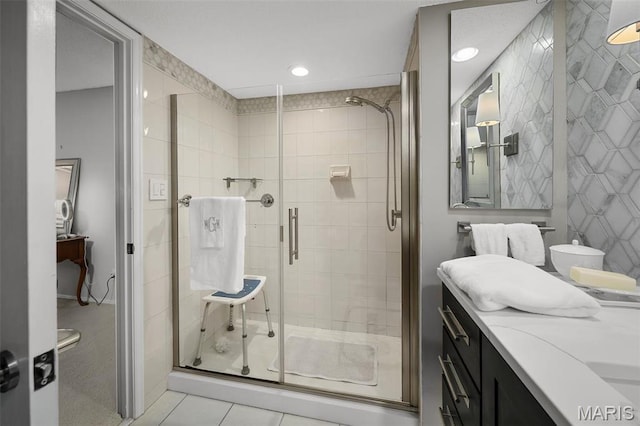 2013 Trailcrest Ln Unit 7, Saint Louis, MO 63122 - bathroom featuring vanity, a stall shower, recessed lighting, and tile patterned floors