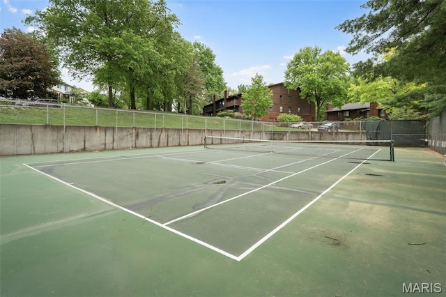 2013 Trailcrest Ln Unit 7, Saint Louis, MO 63122 - view of tennis court featuring fence