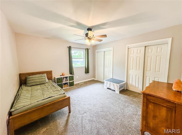 504 Leawood Dr, Swansea, IL 62226 - carpeted bedroom featuring two closets, ceiling fan, and baseboards