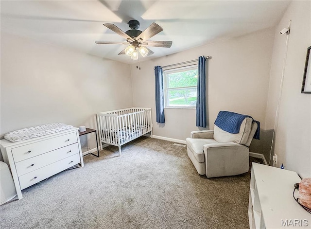 504 Leawood Dr, Swansea, IL 62226 - carpeted bedroom with a crib, baseboards, and ceiling fan