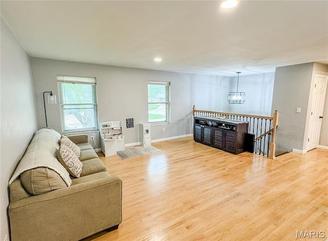 504 Leawood Dr, Swansea, IL 62226 - living area with a chandelier, recessed lighting, baseboards, and light wood-style floors