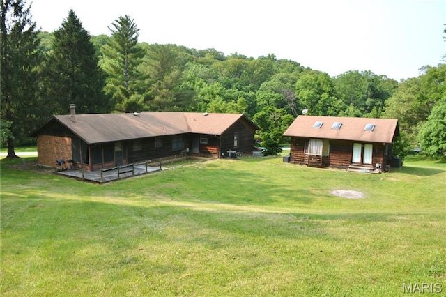 258 Hideaway Trl, Eureka, MO 63025 - rear view of property with a yard and a forest view