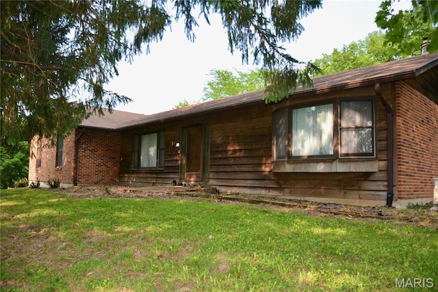 258 Hideaway Trl, Eureka, MO 63025 - view of front of house with brick siding and a front lawn