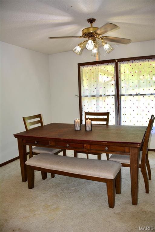 258 Hideaway Trl, Eureka, MO 63025 - dining room featuring light carpet, ceiling fan, and baseboards