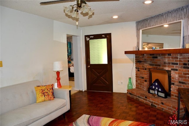 258 Hideaway Trl, Eureka, MO 63025 - living area with ceiling fan, a textured ceiling, and recessed lighting