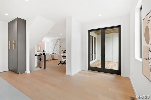 215 N Sarah St Unit 12, Saint Louis, MO 63108 - corridor with wood finished floors, french doors, recessed lighting, and baseboards