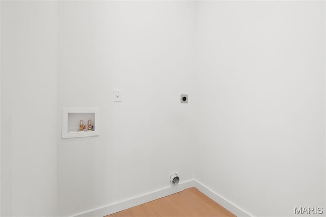 215 N Sarah St Unit 12, Saint Louis, MO 63108 - washroom featuring hookup for an electric dryer, baseboards, hookup for a washing machine, and light wood-style floors
