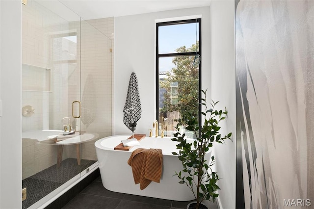 215 N Sarah St Unit 12, Saint Louis, MO 63108 - full bathroom with tile patterned flooring, a shower stall, and a freestanding tub