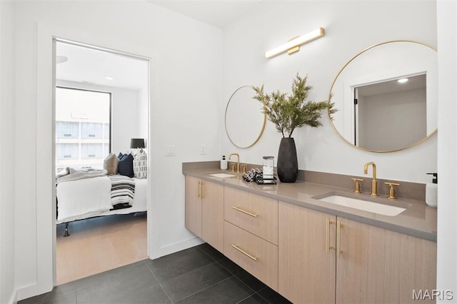 215 N Sarah St Unit 12, Saint Louis, MO 63108 - bathroom featuring tile patterned floors and double vanity