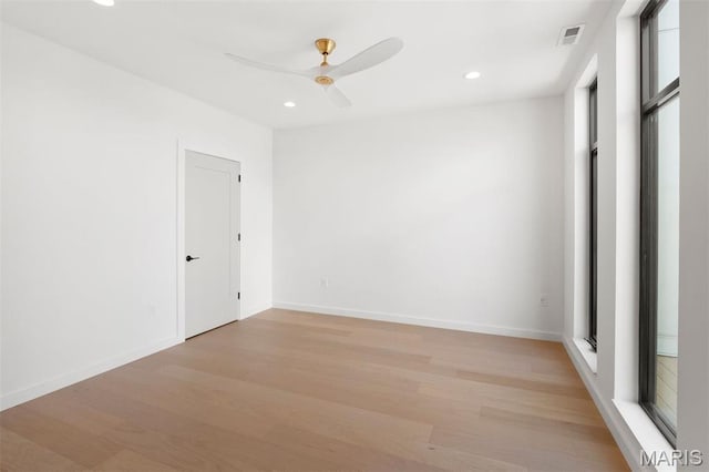 215 N Sarah St Unit 12, Saint Louis, MO 63108 - spare room with light wood-type flooring, ceiling fan, recessed lighting, and baseboards