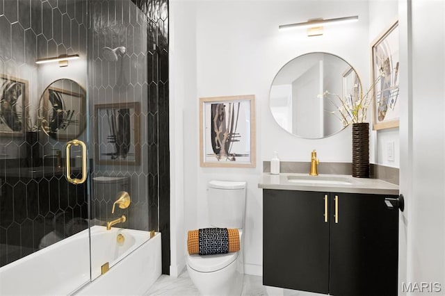 215 N Sarah St Unit 12, Saint Louis, MO 63108 - bathroom featuring toilet, marble finish floors, vanity, and bath / shower combo with glass door