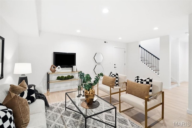 215 N Sarah St Unit 12, Saint Louis, MO 63108 - living area with stairway, recessed lighting, light wood-style flooring, and baseboards