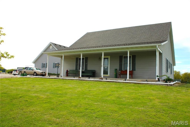 16255 Monroe Rd Unit 875, Paris, MO 65275 - back of house with a yard and covered porch