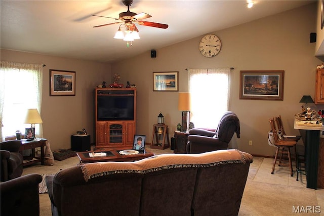 16255 Monroe Rd Unit 875, Paris, MO 65275 - living area featuring vaulted ceiling, ceiling fan, and light colored carpet