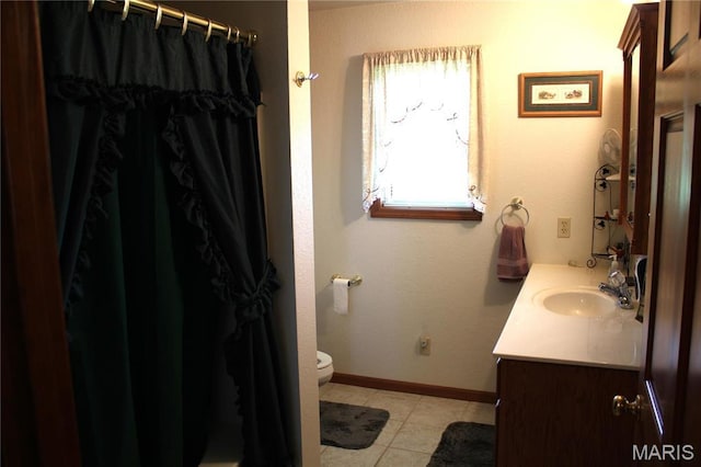 16255 Monroe Rd Unit 875, Paris, MO 65275 - bathroom featuring vanity, toilet, baseboards, tile patterned floors, and a shower with shower curtain