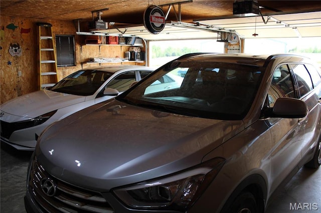 16255 Monroe Rd Unit 875, Paris, MO 65275 - garage featuring a garage door opener