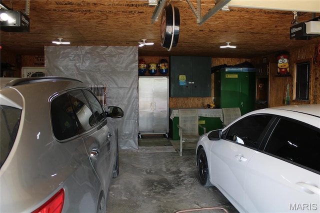 16255 Monroe Rd Unit 875, Paris, MO 65275 - garage with a garage door opener and electric panel