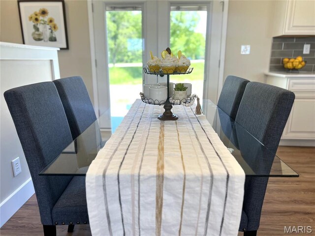 201 S Ashbrook, Bethalto, IL 62010 - dining room with dark wood-style flooring and baseboards