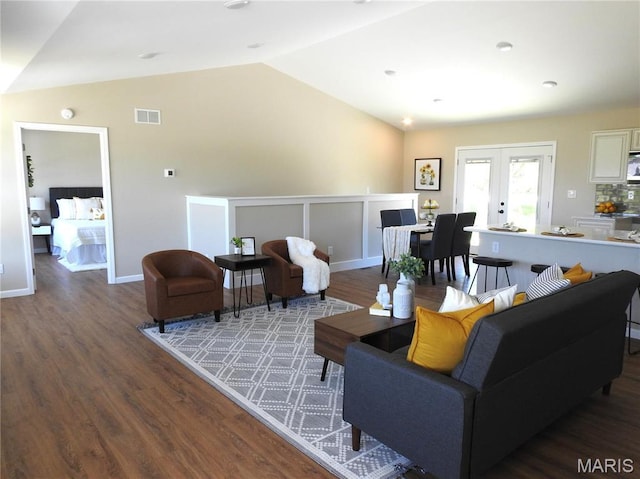 201 S Ashbrook, Bethalto, IL 62010 - living area with wood finished floors, vaulted ceiling, french doors, and baseboards