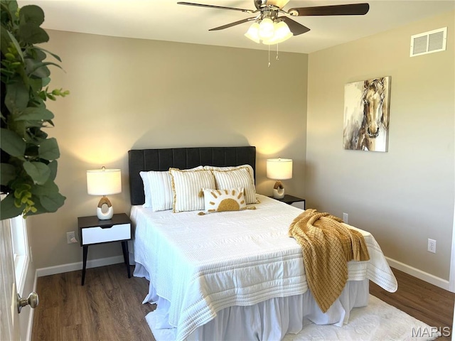 201 S Ashbrook, Bethalto, IL 62010 - bedroom with wood finished floors, baseboards, and ceiling fan