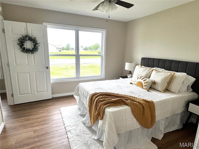 201 S Ashbrook, Bethalto, IL 62010 - bedroom with baseboards, wood finished floors, and a ceiling fan
