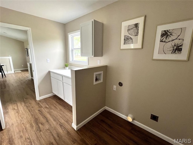 201 S Ashbrook, Bethalto, IL 62010 - laundry room with electric dryer hookup, cabinet space, washer hookup, dark wood-style flooring, and baseboards