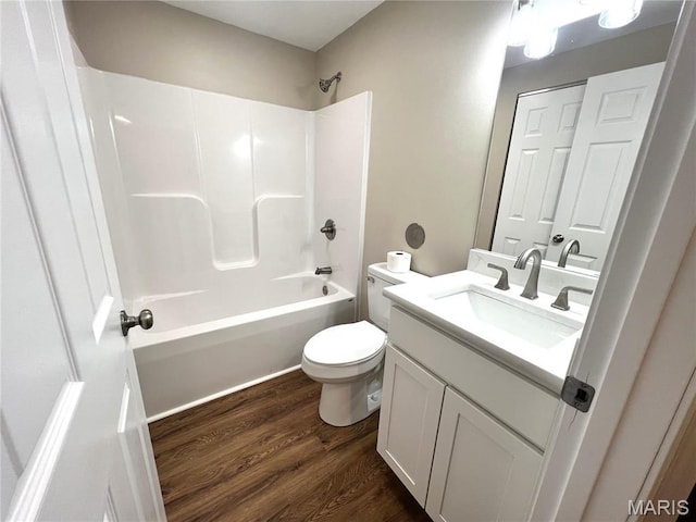 201 S Ashbrook, Bethalto, IL 62010 - full bath with wood finished floors, toilet, vanity, and shower / bathtub combination