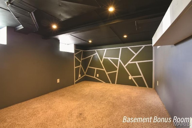 basement featuring carpet flooring and recessed lighting