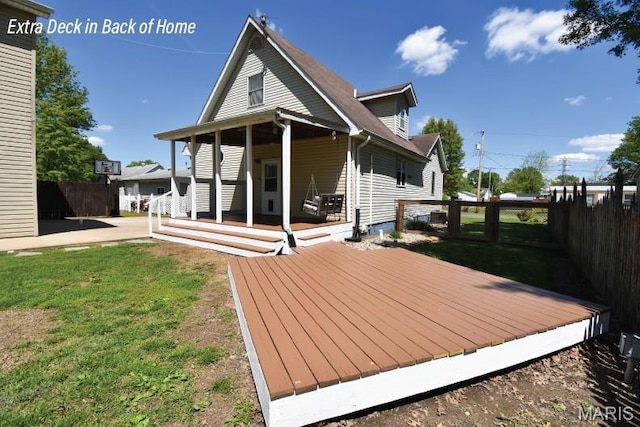 rear view of house with a deck