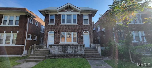 5144 Palm St, Saint Louis, MO 63115 - view of front facade with brick siding