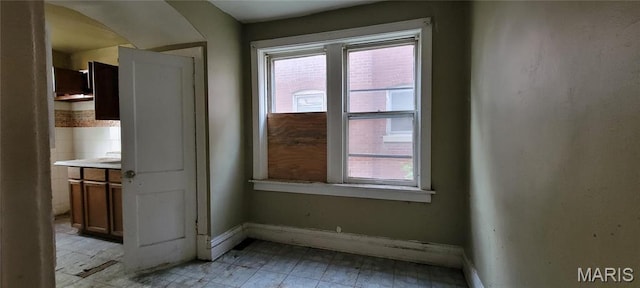 5144 Palm St, Saint Louis, MO 63115 - spare room with healthy amount of natural light and baseboards