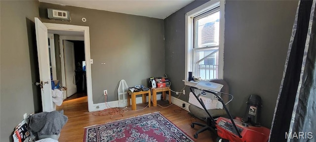 5144 Palm St, Saint Louis, MO 63115 - office with wood finished floors and baseboards