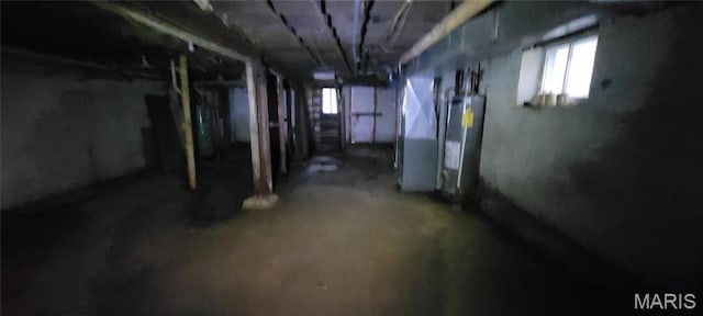5144 Palm St, Saint Louis, MO 63115 - basement with healthy amount of natural light, water heater, and heating unit