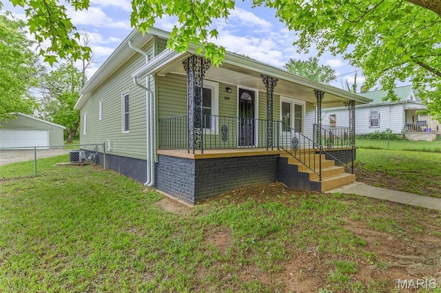 300 Lewis St, Park Hills, MO 63601 - shotgun-style home featuring covered porch, a detached garage, and central AC