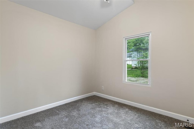 300 Lewis St, Park Hills, MO 63601 - spare room with dark carpet, baseboards, and vaulted ceiling